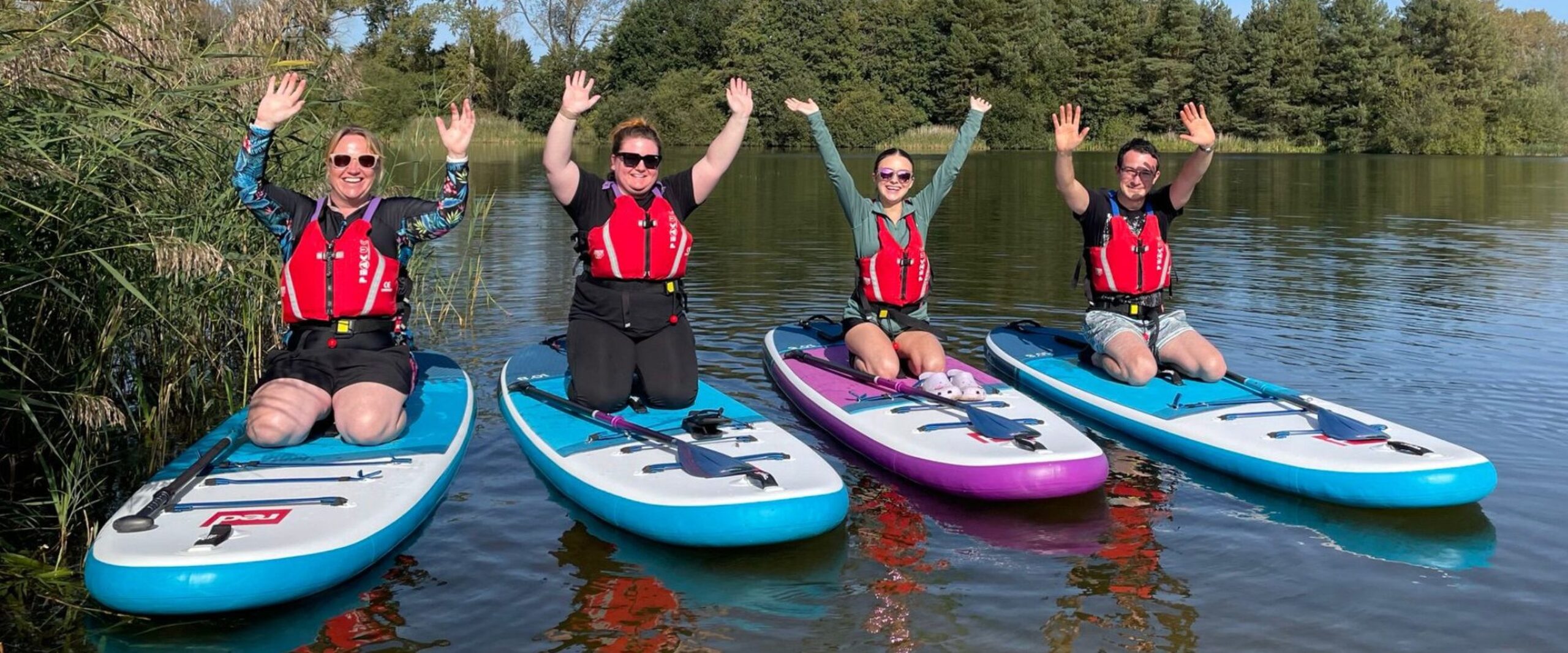 SUP Whales paddle boarding Lynford Water
